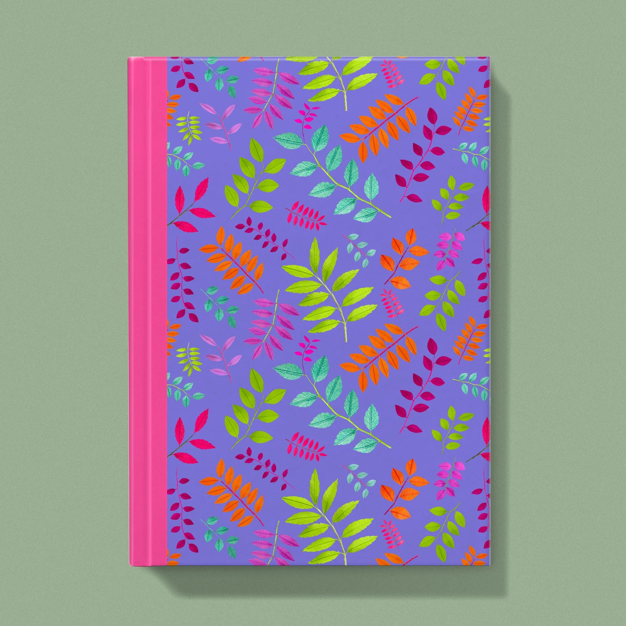 Notebook with a image of colourful handcrafted paper foliage on a purple background colour by paper artist Daphne Fitch.
