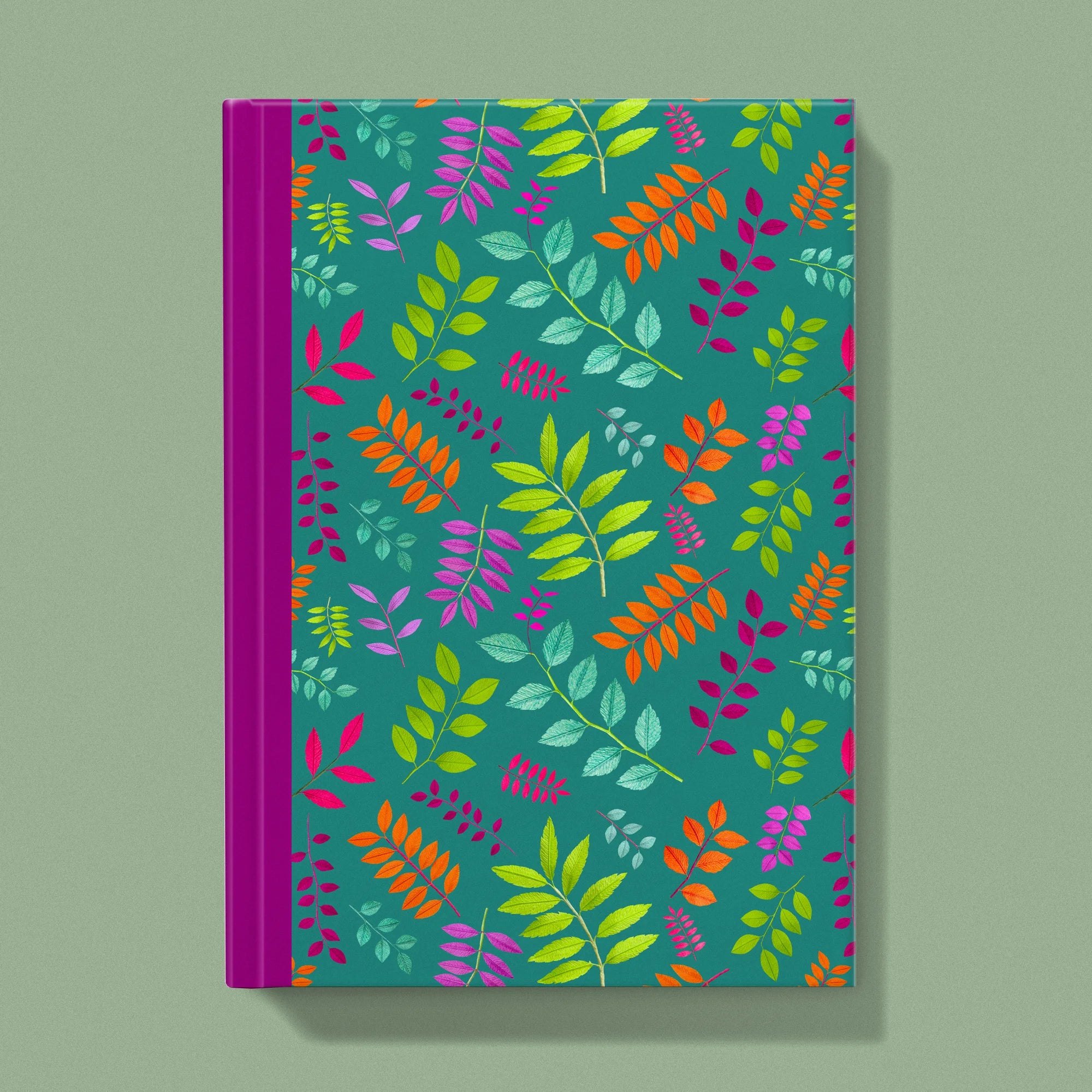 Notebook with a image of colourful handcrafted paper foliage on a teal background colour by paper artist Daphne Fitch.
