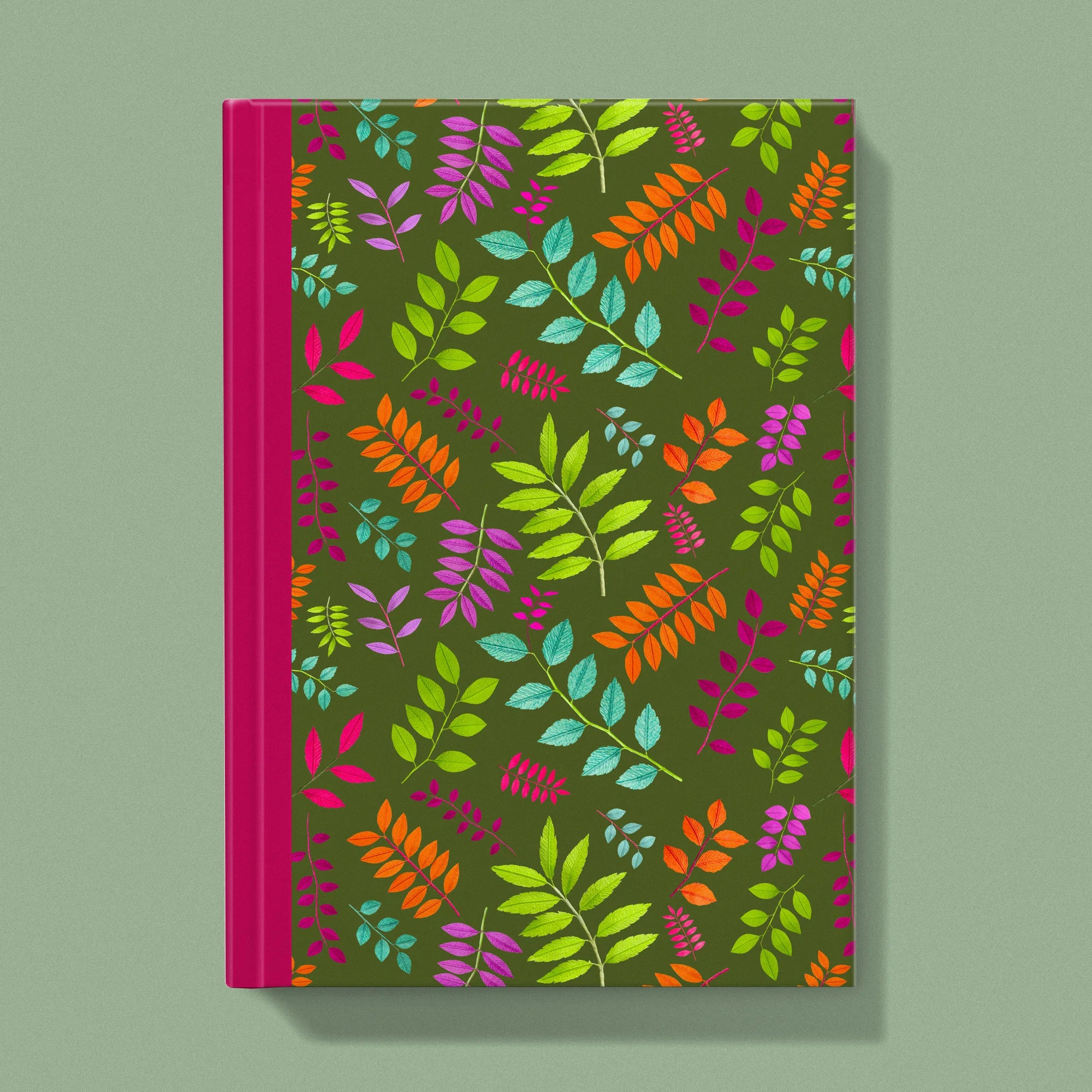Notebook with a image of colourful handcrafted paper foliage on a olive background colour by paper artist Daphne Fitch.
