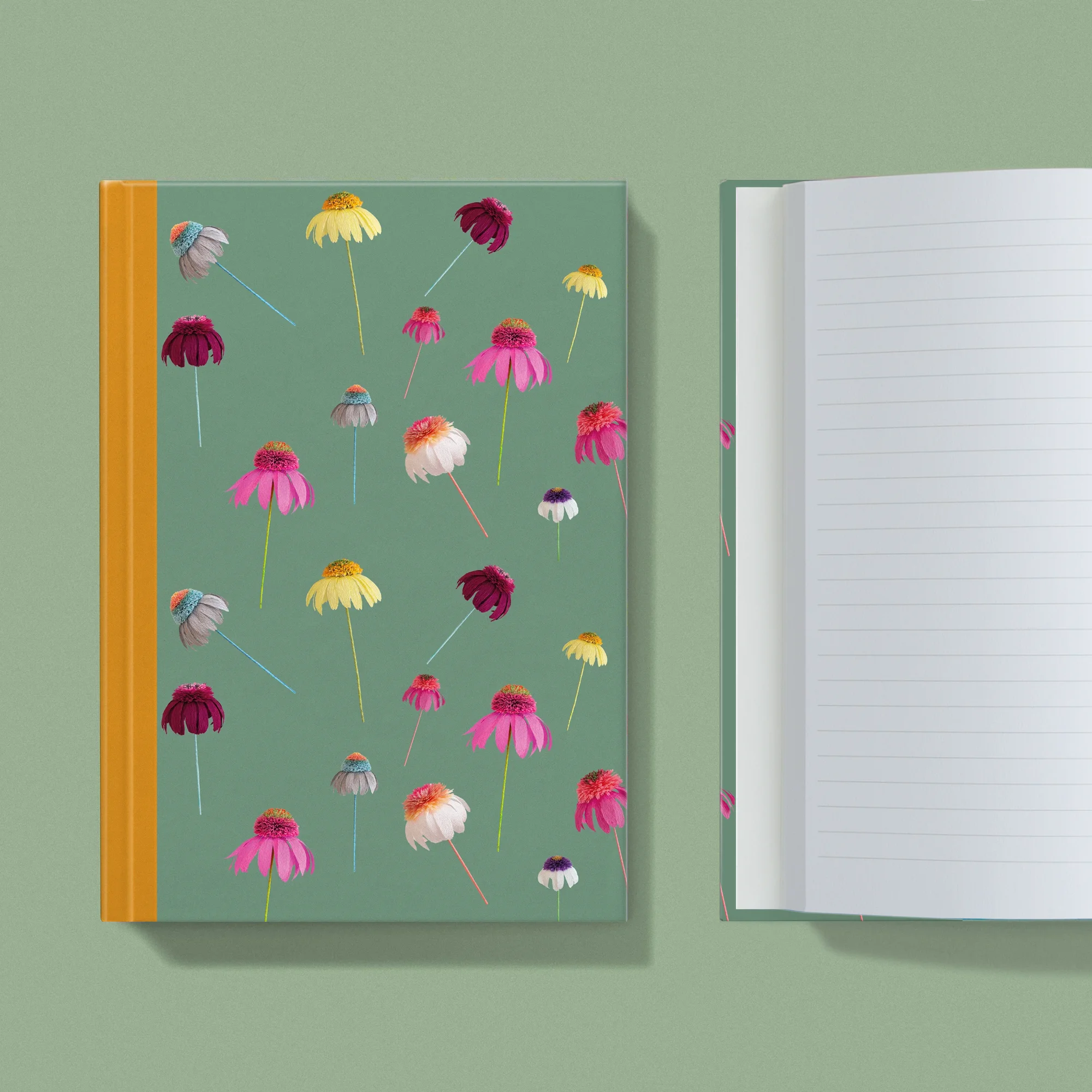 Notebook with a image of colourful handcrafted paper echinacea on a fern green background colour by paper artist Daphne Fitch.