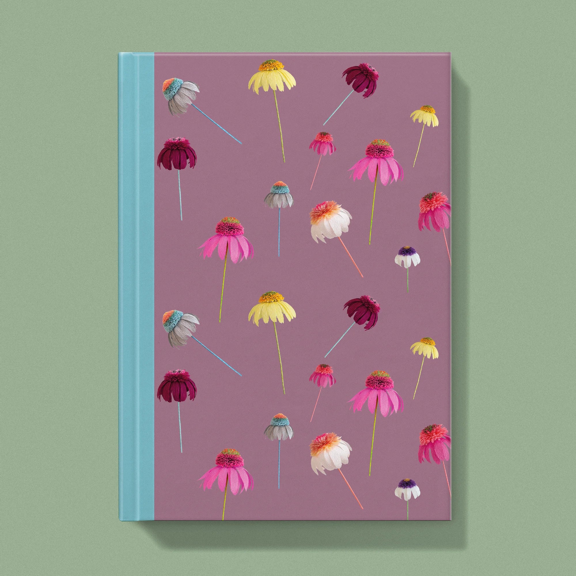 Notebook with a image of colourful handcrafted paper echinacea on a fig background colour by paper artist Daphne Fitch.