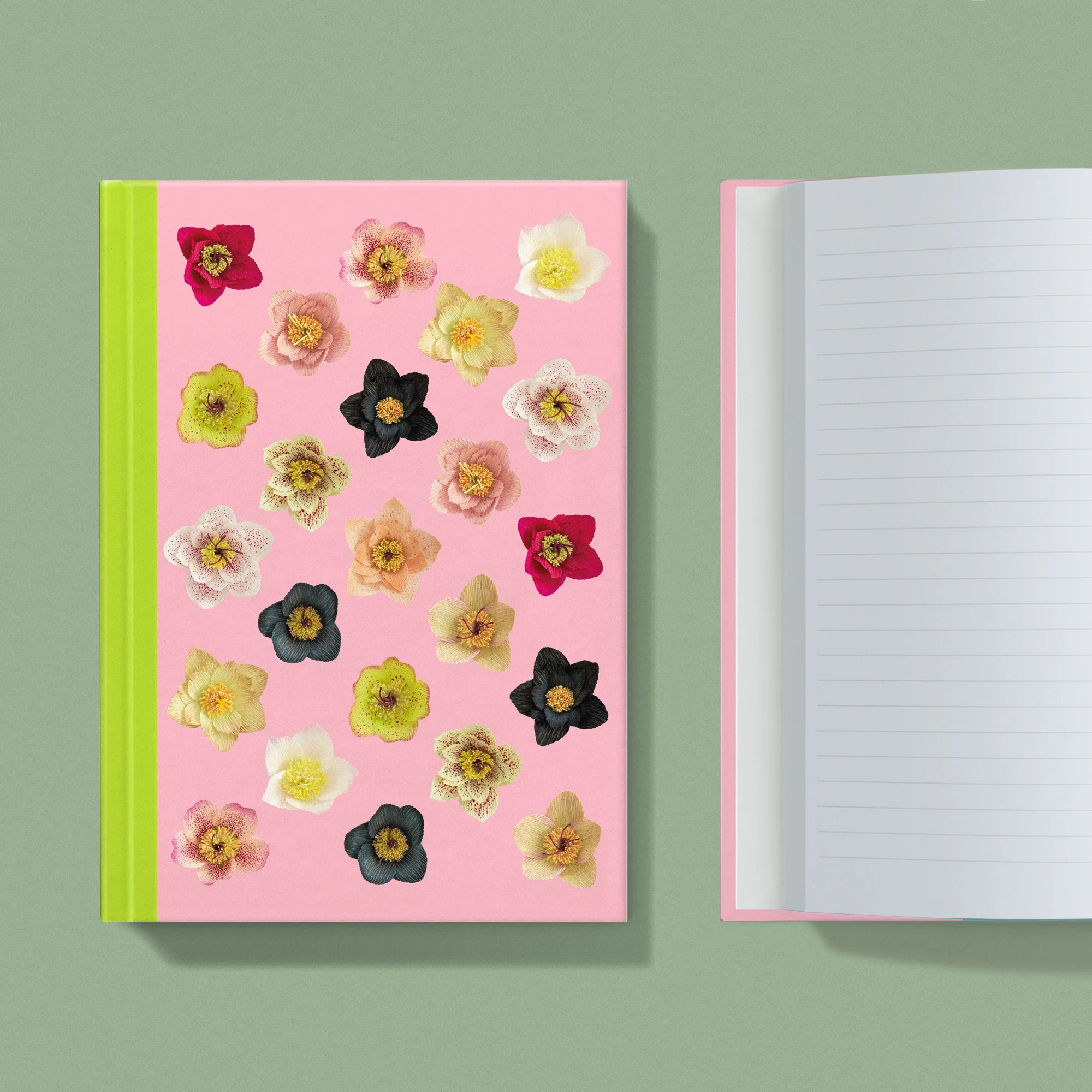 Notebook with a image of colourful handcrafted paper helebores on a light pink background colour by paper artist Daphne Fitch.
