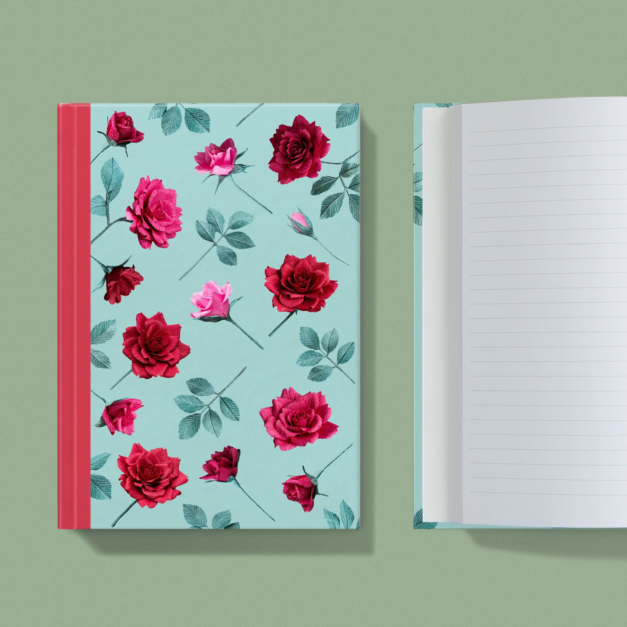 Notebook with a image of colourful handcrafted paper red and pink roses on a light blue background colour by paper artist Daphne Fitch.