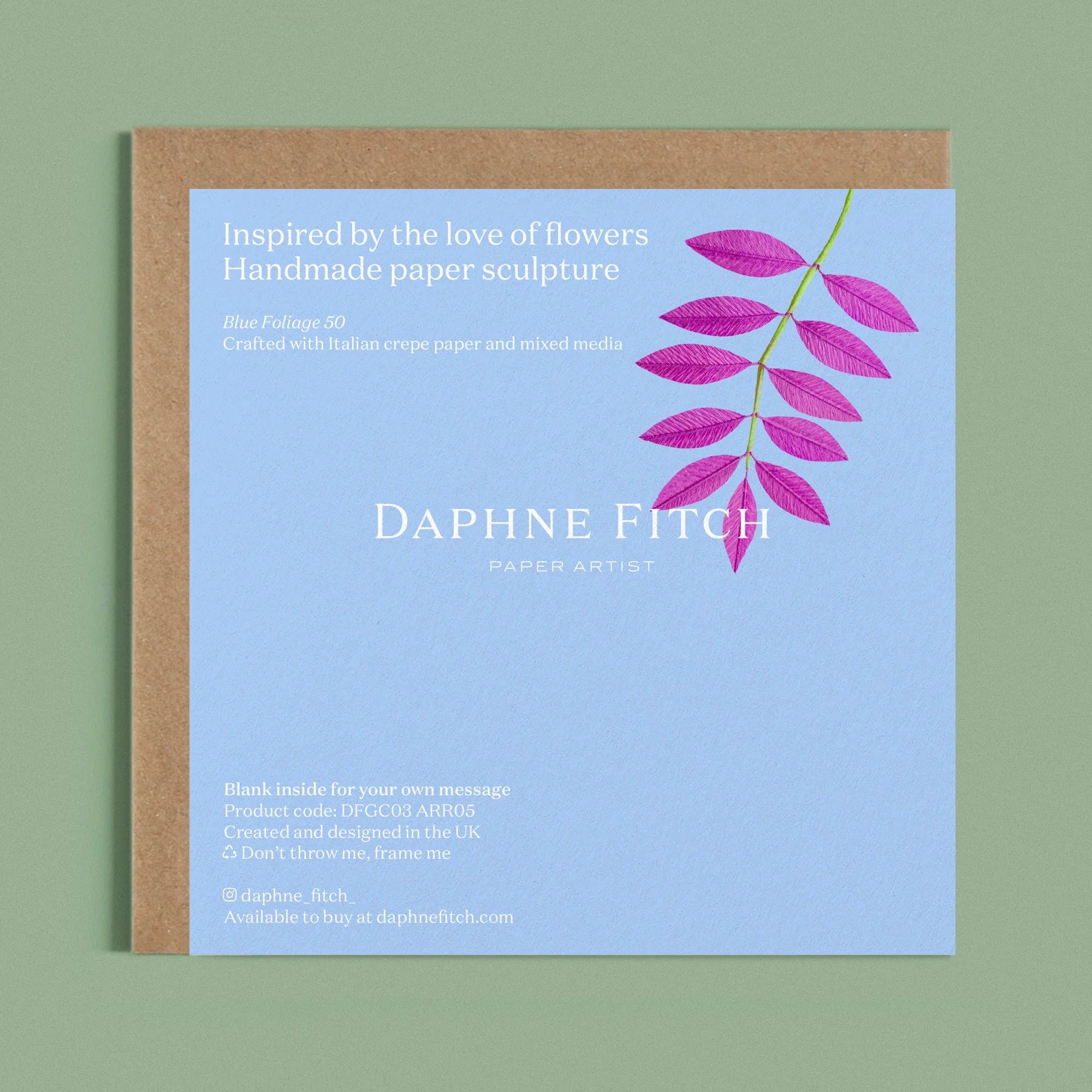 Image of the back of a Happy Birthday Greeting card with colourful handcrafted paper purple foliage on a light blue background by paper artist Daphne Fitch.