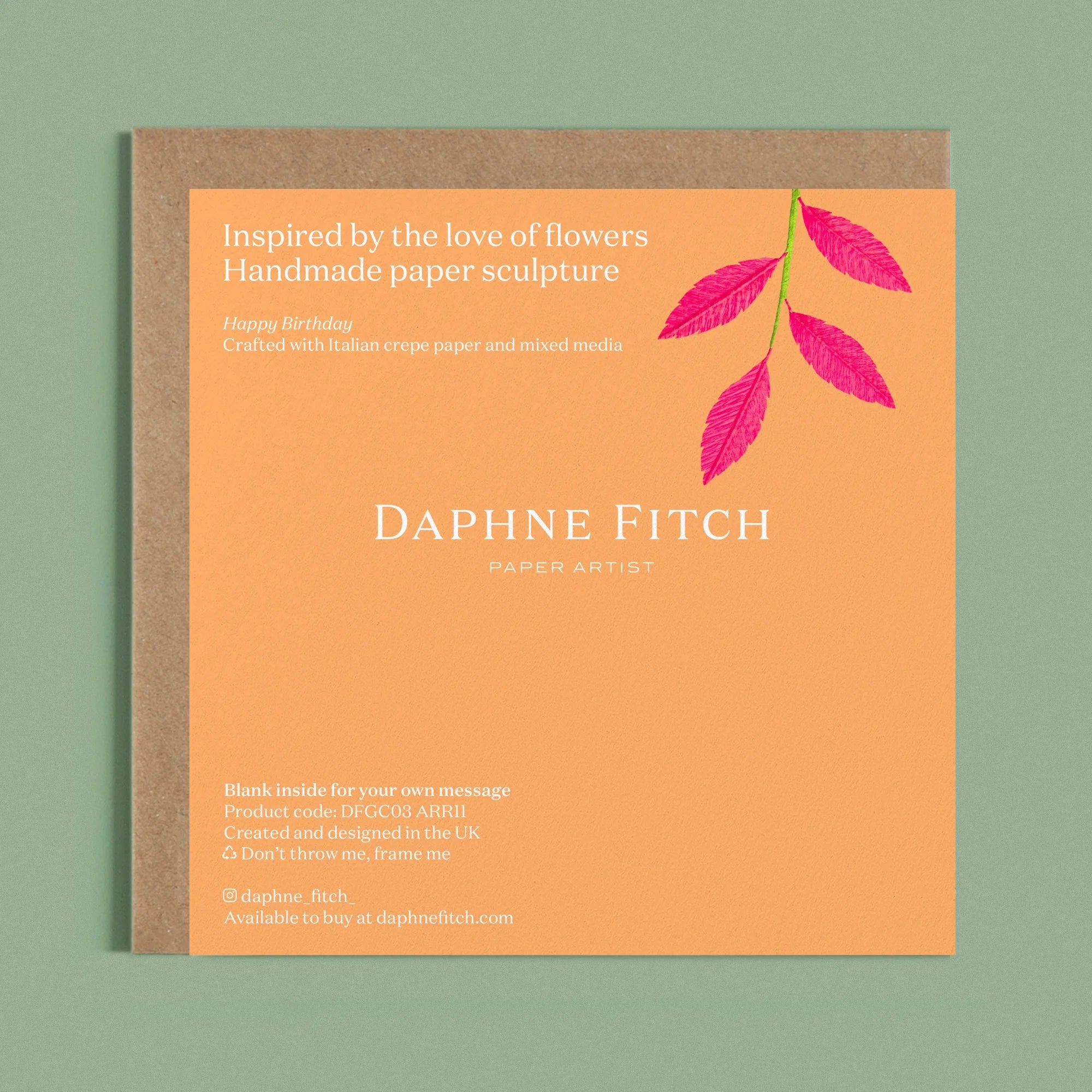 Image of the back of a Happy Birthday Greeting card with colourful handcrafted paper pink foliage on a light orange background by paper artist Daphne Fitch.