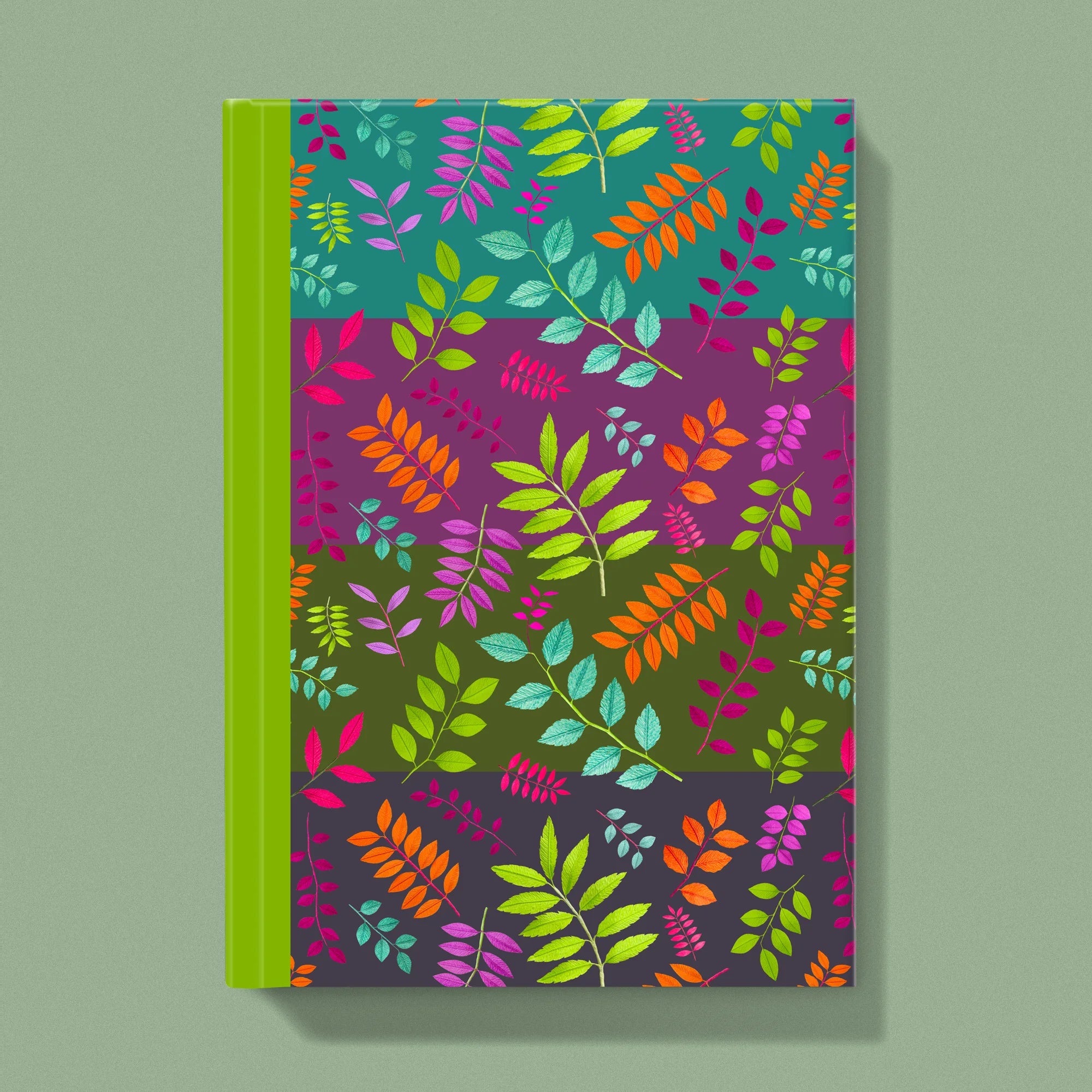 Notebook with a image of colourful handcrafted paper foliage on a stripe background colour by paper artist Daphne Fitch.