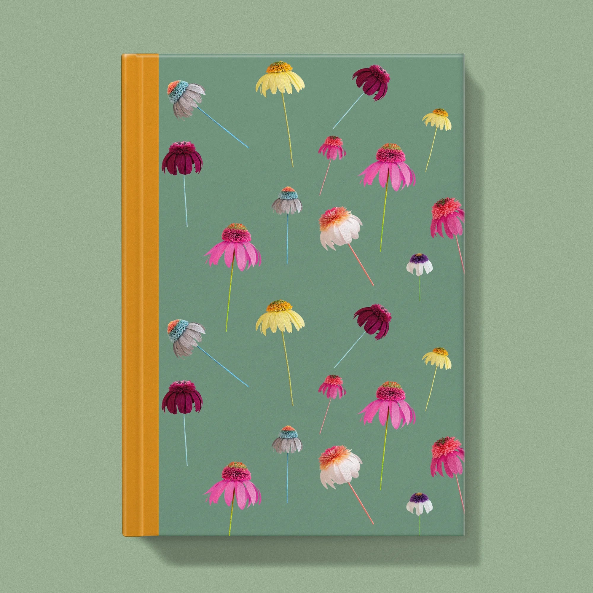 Notebook with a image of colourful handcrafted paper echinacea on a fern green background colour by paper artist Daphne Fitch.