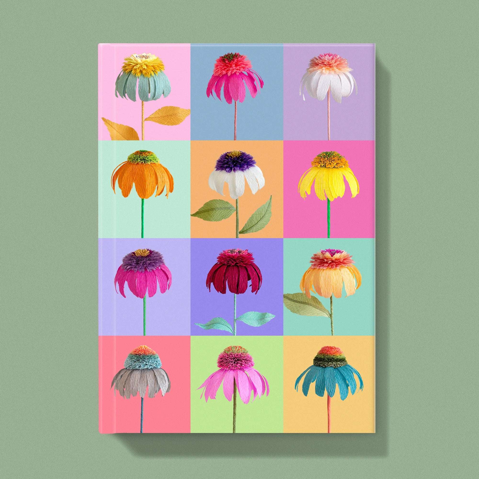 Notebook with a image of colourful handcrafted paper echinacea on a multiple colour grid background by paper artist Daphne Fitch.