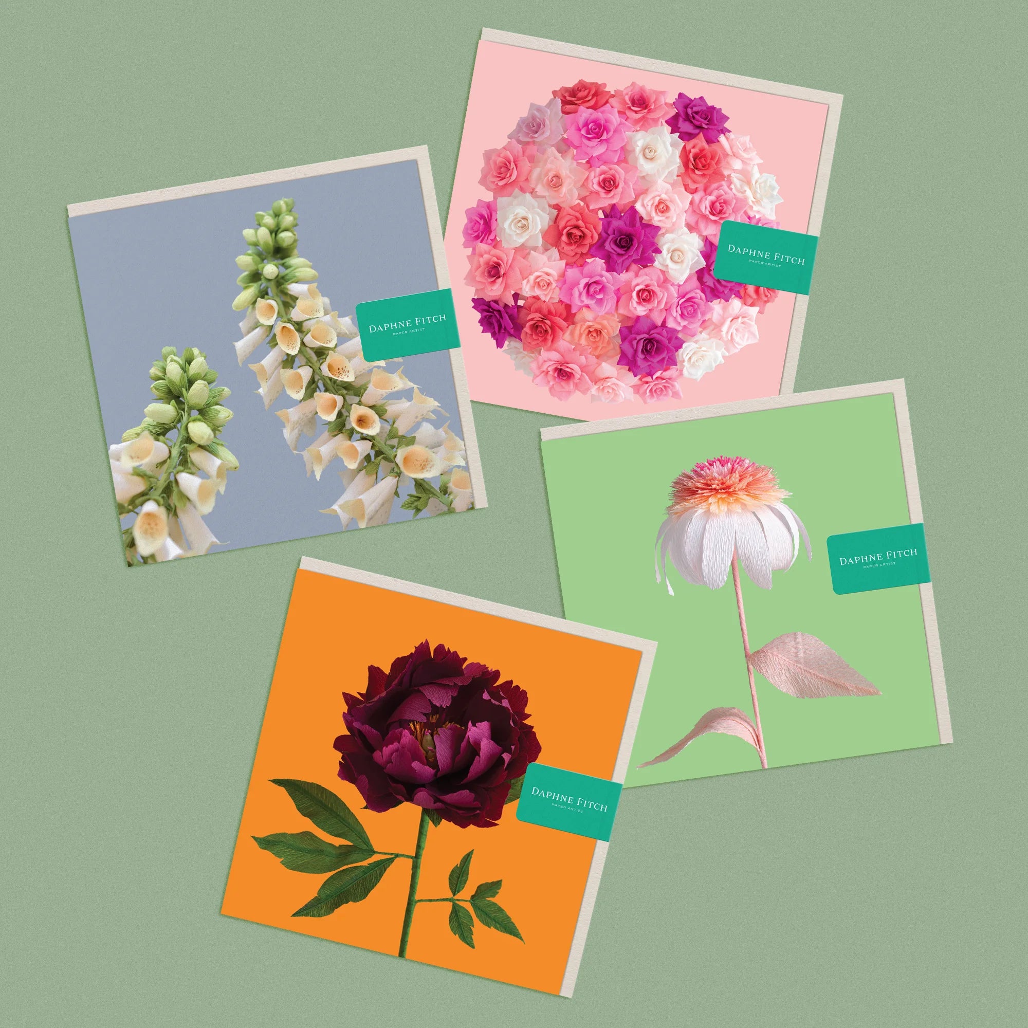 Set of 4 greeting cards, with images of a handcrafted paper foxglove, rose bombe, peony and echinacea by paper artist Daphne Fitch.